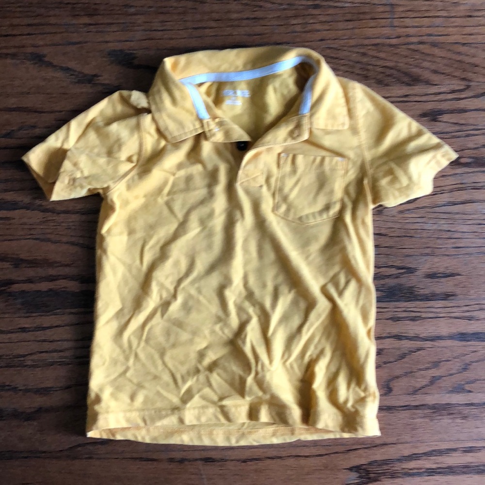 yellow polo shirt